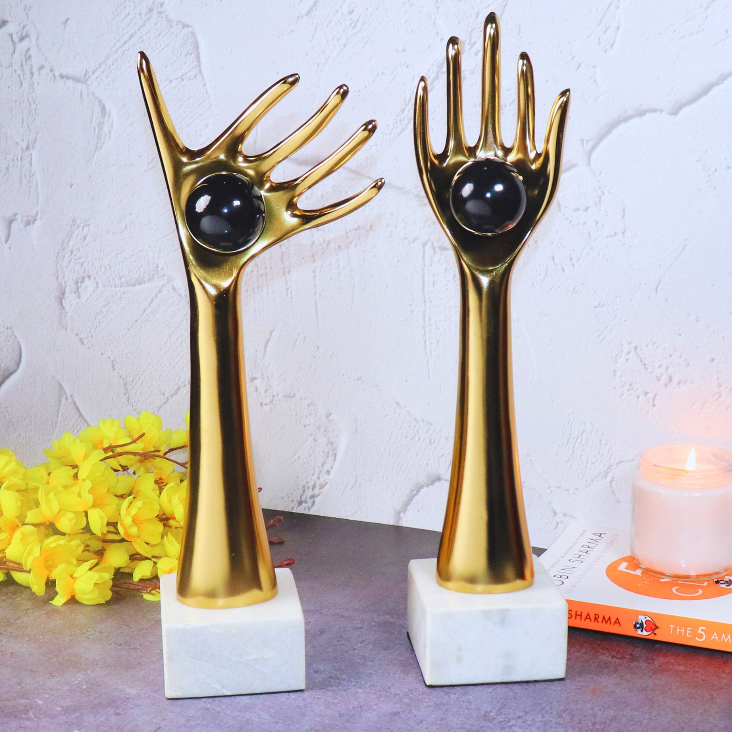 The Golden auspicious hands holding balls in aluminum set of 2