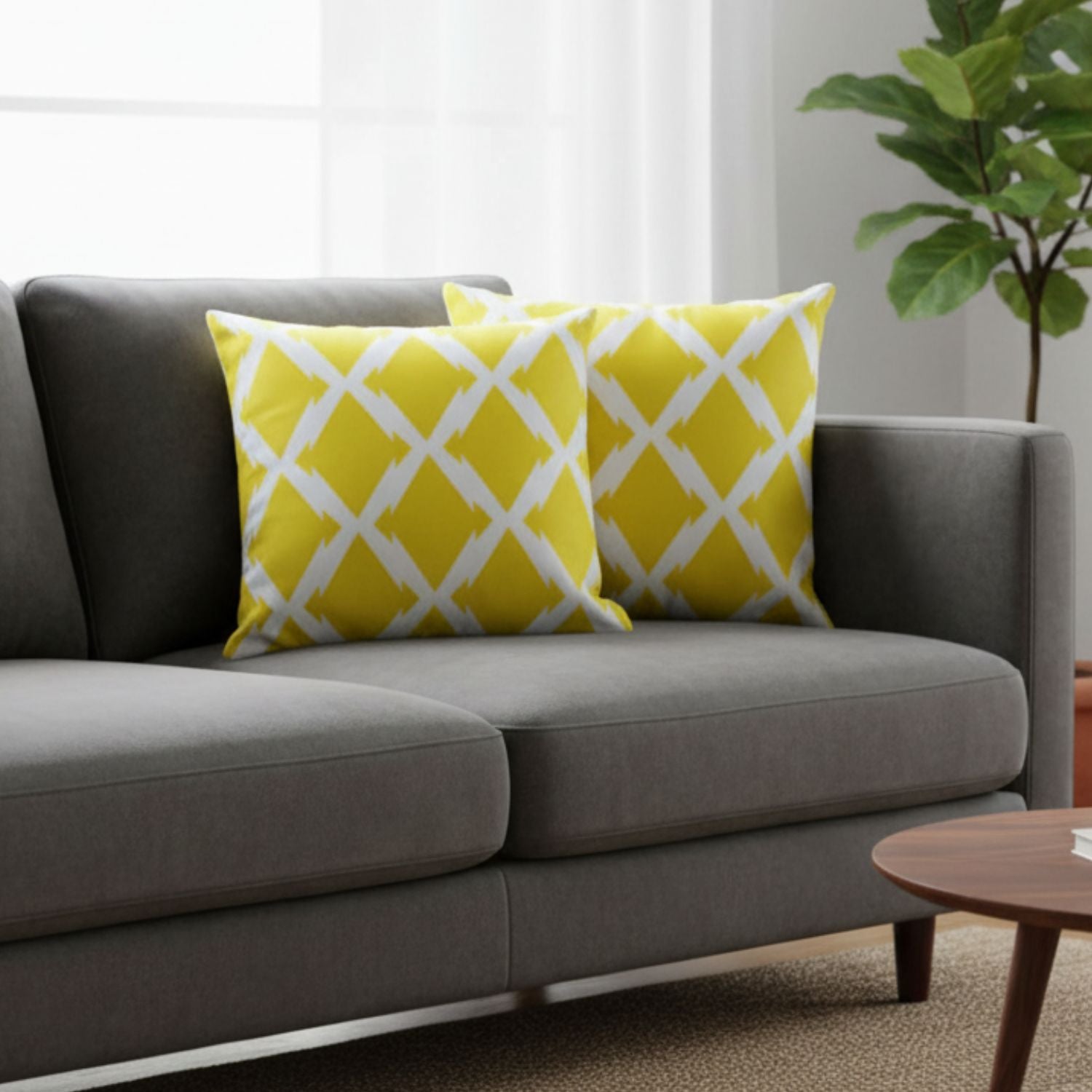 Loosebucket Lemon Shot Cushion Covers  Gray sofa with yellow patterned cushions in a living room setting