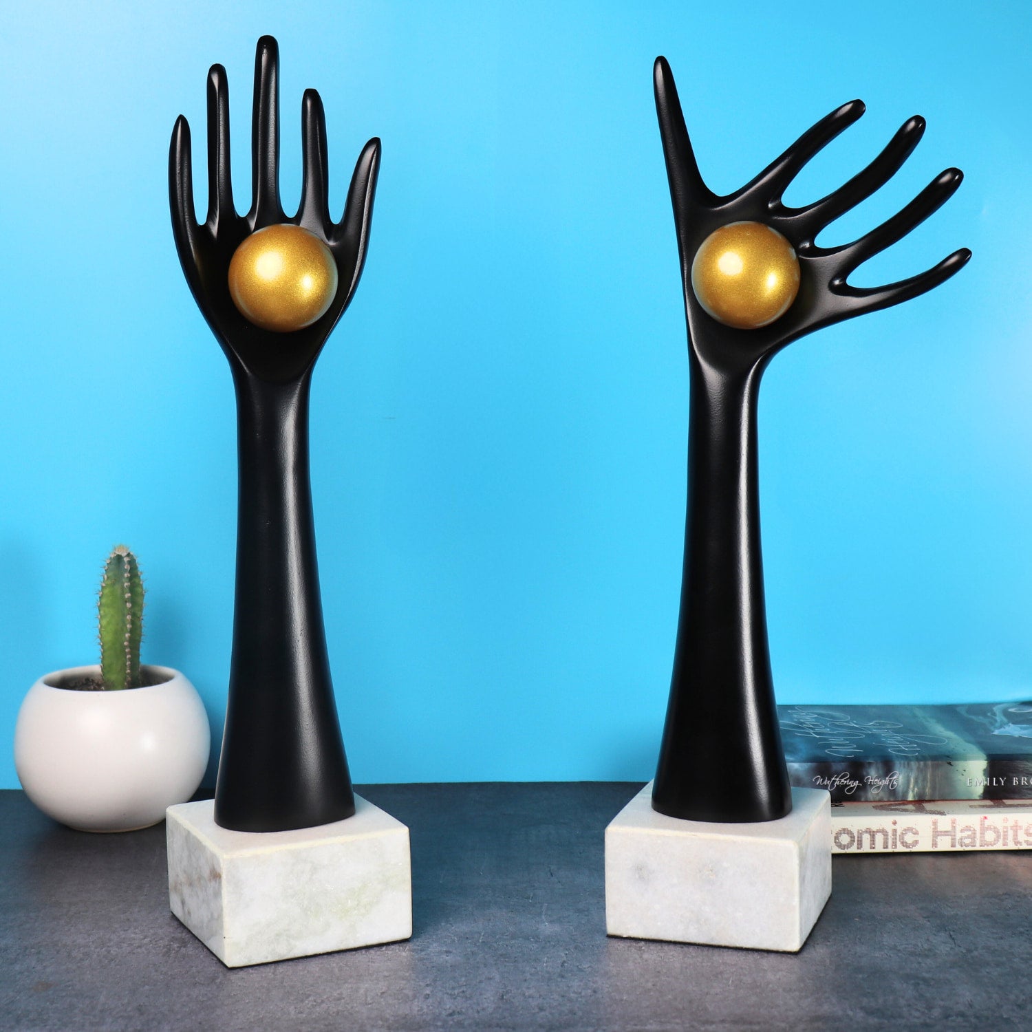 The auspicious hands holding balls in aluminum set of 2