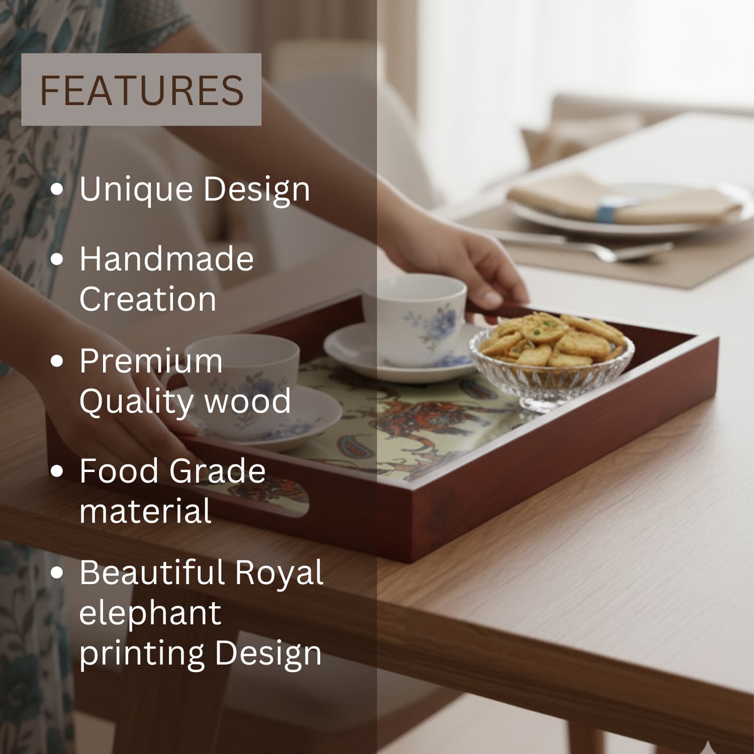 Loosebucket Walking Elephant Wooden tray with food and tea on a table, featuring text about its features.