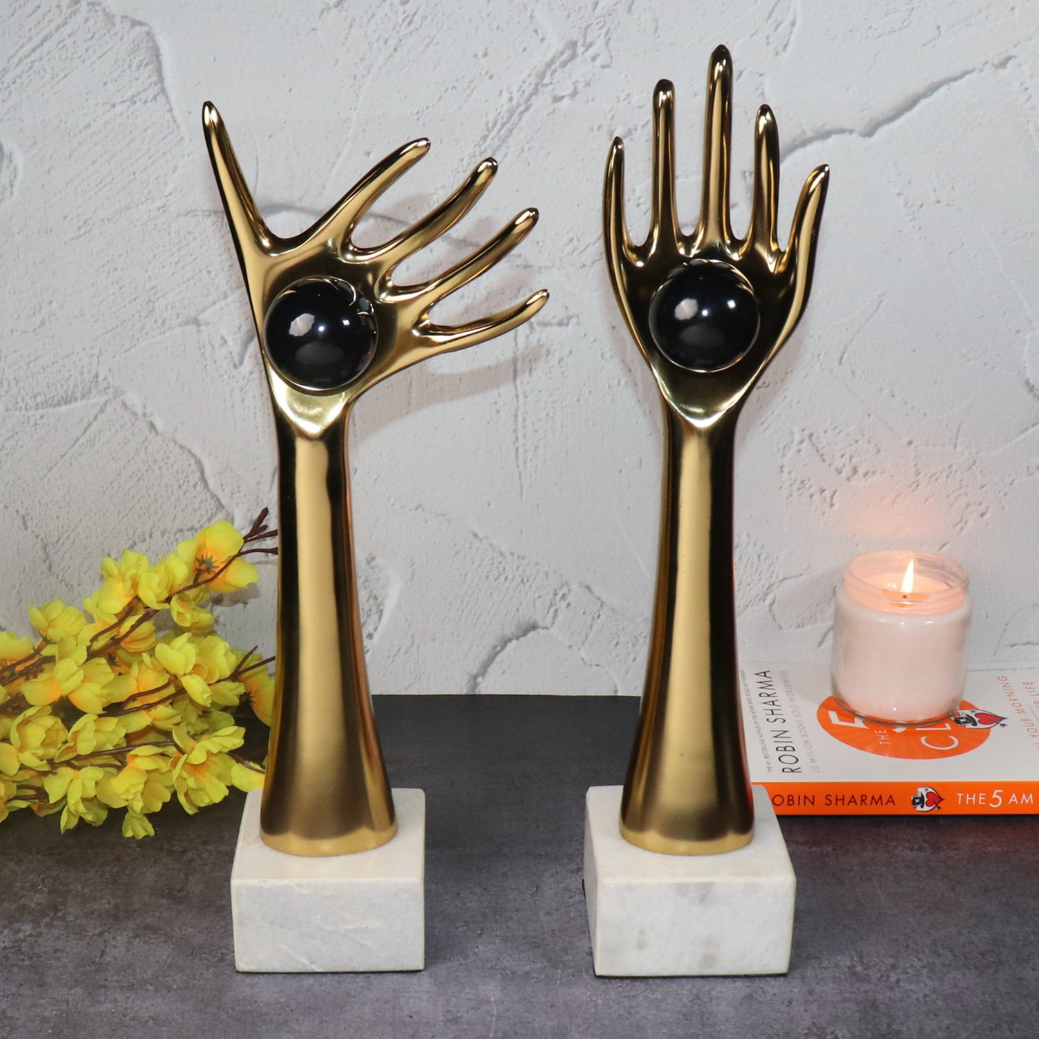 The Golden auspicious hands holding balls in aluminum set of 2