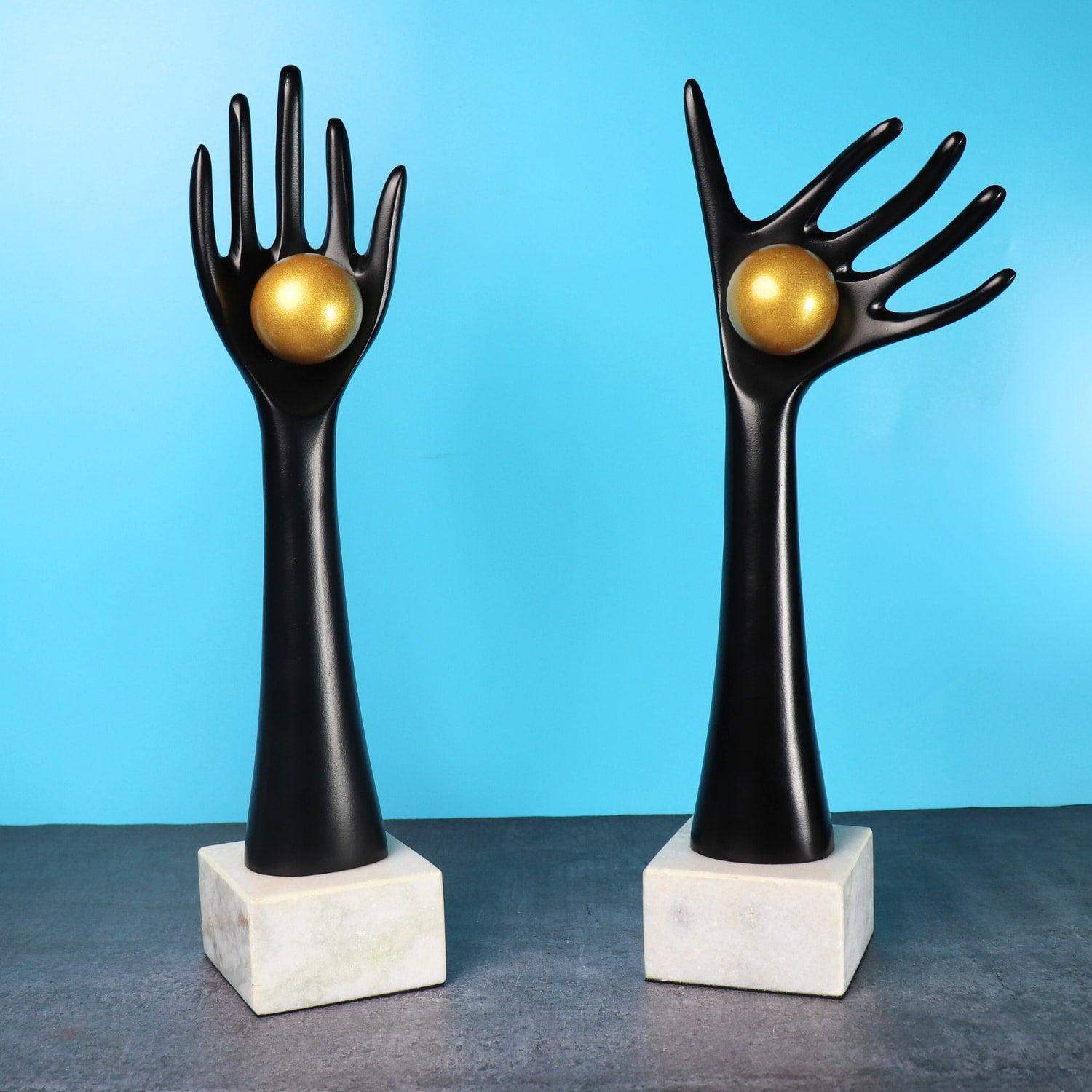 The auspicious hands holding balls in aluminum set of 2