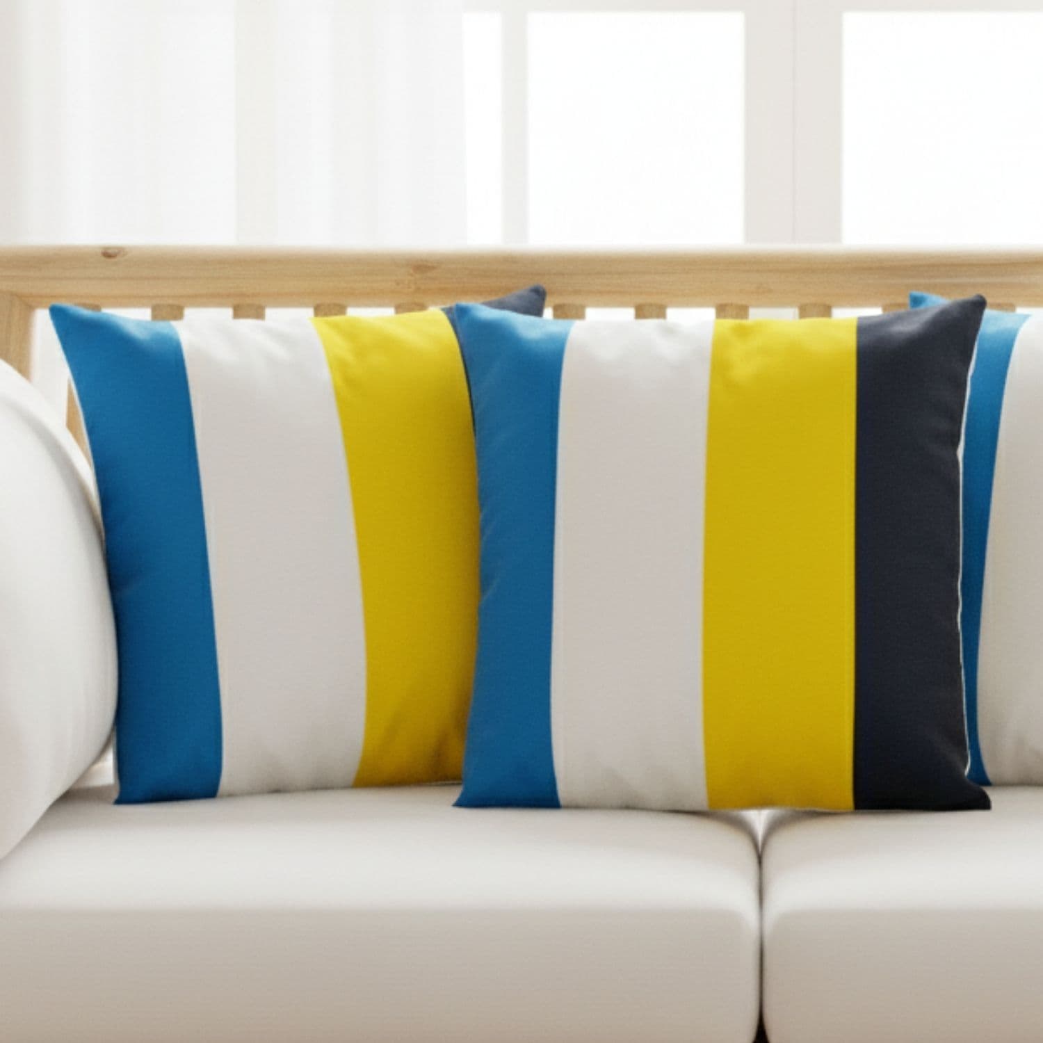Loosebucket Italiano Cushion covers,Striped cushions with blue, yellow, and navy on a white sofa.