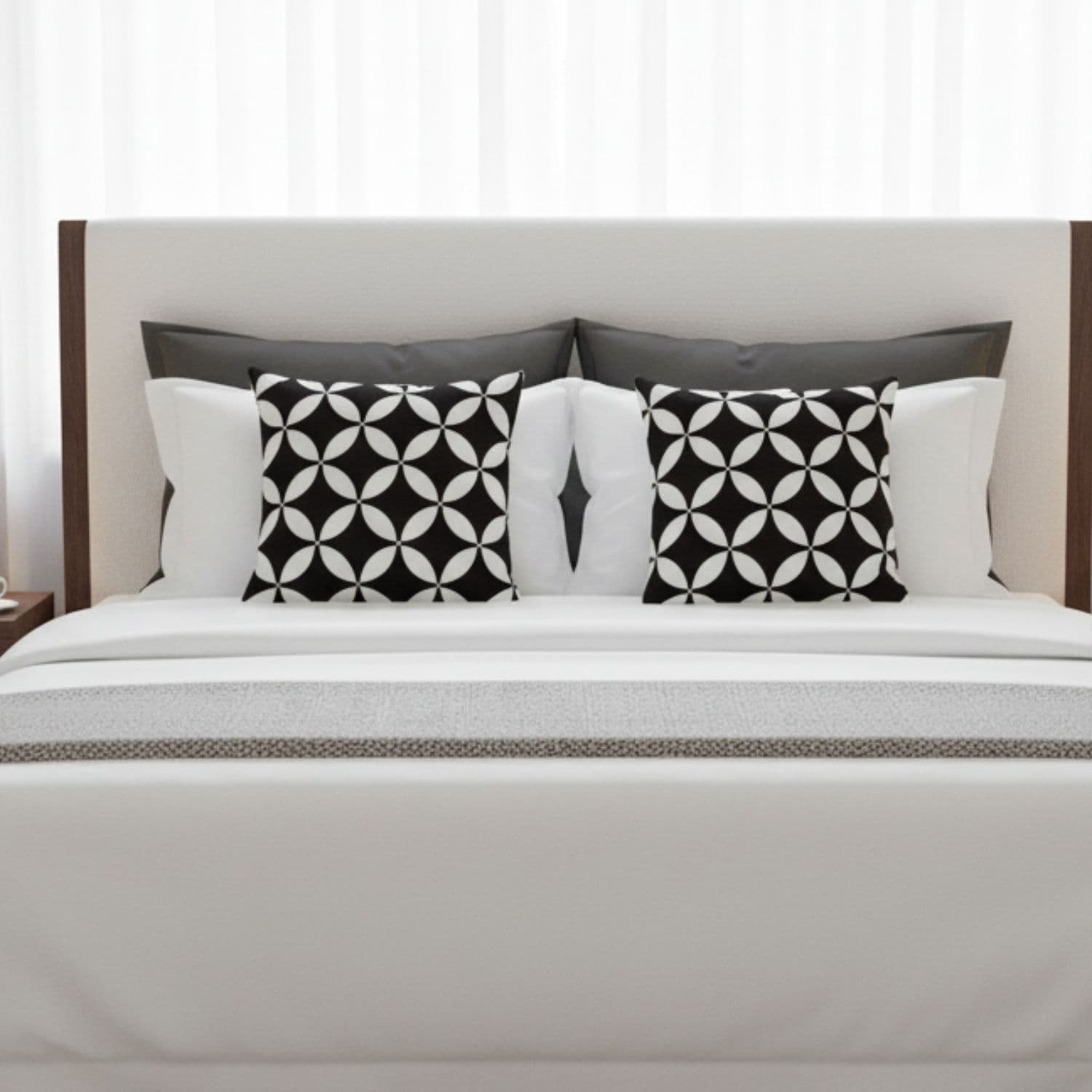 Loosebucket Black Luxury cushion covers ,Bed with decorative Cushions featuring black and white patterns on a neutral background