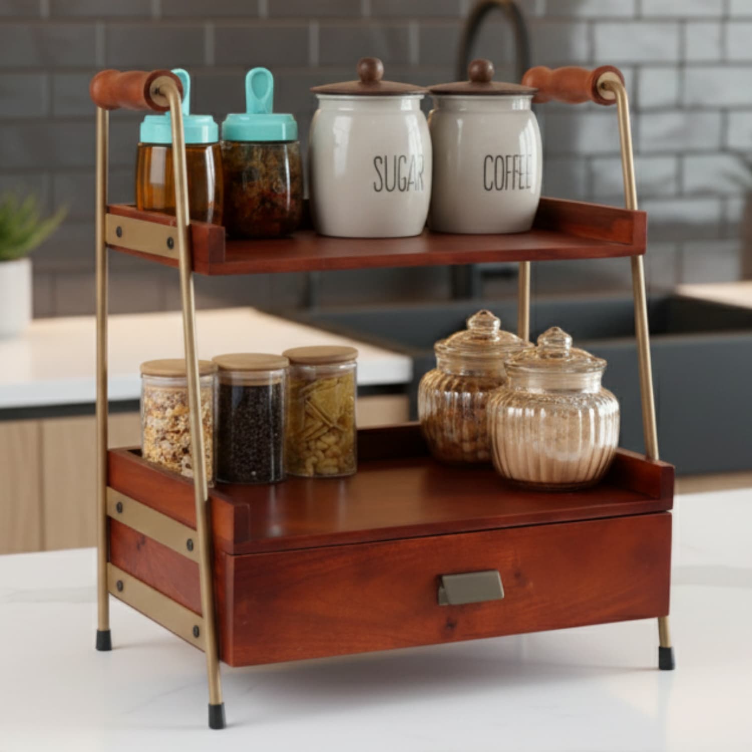 Loosebucket Terra Manila A two-tier wooden kitchen organizer with a drawer and metal accents, displaying various kitchen items like jars and containers.